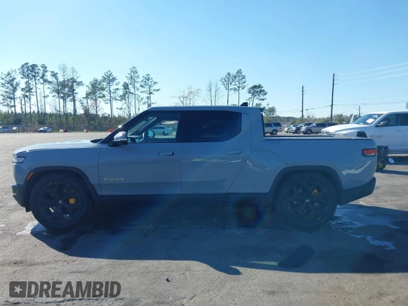 2024 Rivian R1T Adventure z VIN 7FCTGAAA5RN033799, wystawiony jako IAAI lot #41606562 z przebiegiem 9 449 mil mil oraz . Historia ofert i sprzedaży dostępna na DreamBid. Obrazek 14.