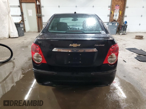 2012 Chevrolet Sonic LT z VIN 1G1JD5SH2C4148200, wystawiony jako Copart lot #74896064 z przebiegiem 104 692 mil mil oraz Szkoda całkowita • Salvage title. Historia ofert i sprzedaży dostępna na DreamBid. Obrazek 6.