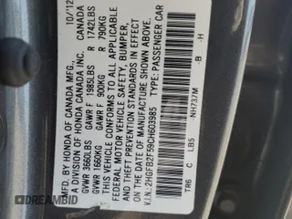 2012 Honda Civic LX z VIN 2HGFB2F59CH603985, wystawiony jako Copart lot #55675435 z przebiegiem 125 567 mil mil oraz Szkoda całkowita • Salvage title. Historia ofert i sprzedaży dostępna na DreamBid. Obrazek 13.