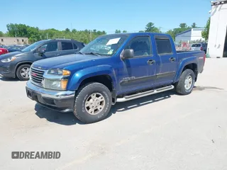 2005 GMC Canyon 1SF SLE Z71 z VIN 1GTDT136858196745, wystawiony jako IAAI lot #42401513 z przebiegiem 154 387 mil mil oraz . Historia ofert i sprzedaży dostępna na DreamBid. Obrazek 2.