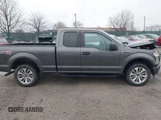 2017 Ford F-150 XL z VIN 1FTFX1EFXHKE03394, wystawiony jako IAAI lot #41471000 z przebiegiem 217 333 mil mil oraz . Historia ofert i sprzedaży dostępna na DreamBid. Obrazek 13.