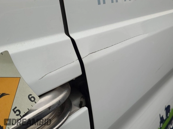 2016 Ford Transit Cargo with VIN 1FTYE1YM0GKB08764, listed as a IAAI auction lot 42175474 with 335,038 mi miles. Bid and sale history available at carsss.com. Image 1.