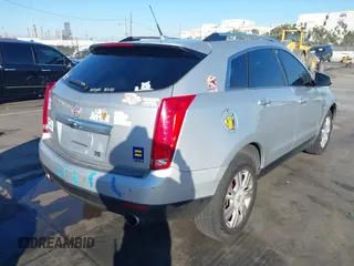 2013 Cadillac SRX Luxury Collection with VIN 3GYFNGE36DS591211, listed as a IAAI auction lot 41319932 with 174,059 mi miles. Bid and sale history available at carsss.com. Image 4.