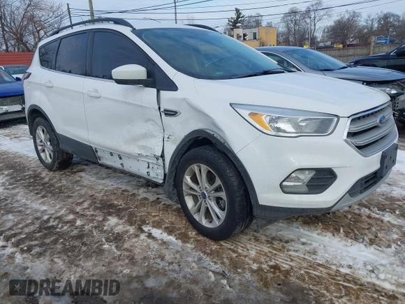 2018 Ford Escape SE with VIN 1FMCU0GD1JUC48757, listed as a IAAI auction lot 41631583 with 80,700 mi miles. Bid and sale history available at carsss.com. Image 1.