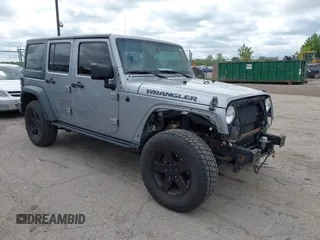 2016 Jeep Wrangler Unlimited Sport z VIN 1C4BJWDG0GL142311, wystawiony jako IAAI lot #42295333 z przebiegiem 102 004 mil mil oraz . Historia ofert i sprzedaży dostępna na DreamBid. Obrazek 1.