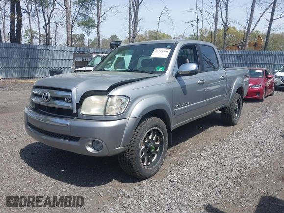 2004 Toyota Tundra SR5 with VIN 5TBDT44174S434897, listed as a IAAI auction lot 42128806 with 218,054 mi miles and . Bid and sale history available at DreamBid. Image 2.