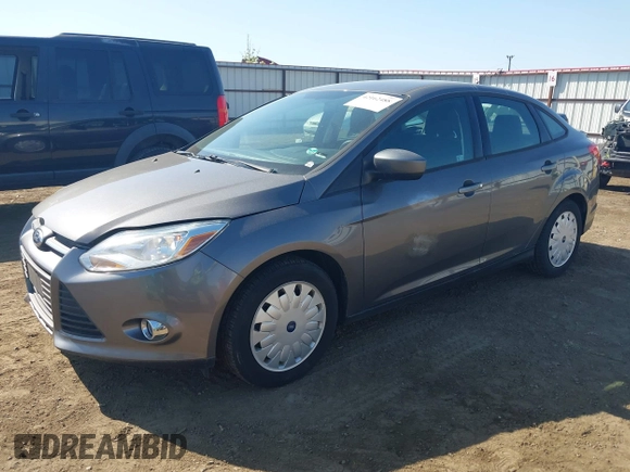 2012 Ford Focus SE with VIN 1FAHP3F26CL314852, listed as a IAAI auction lot 42162488 with 101,782 mi miles. Bid and sale history available at carsss.com. Image 2.