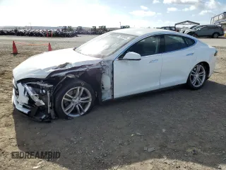 2013 Tesla Model S с VIN 5YJSA1CN1DFP11636, выставлен на аукционе Copart как лот 78333554 с пробегом 101 625 миль миль и Списание • Salvage title. История ставок и продаж доступна на DreamBid. Изображение 1.