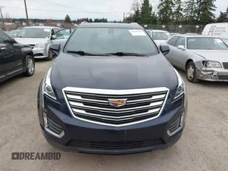 2017 Cadillac XT5 FWD with VIN 1GYKNARS2HZ188557, listed as a IAAI auction lot 41840764 with 104,524 mi miles. Bid and sale history available at carsss.com. Image 12.