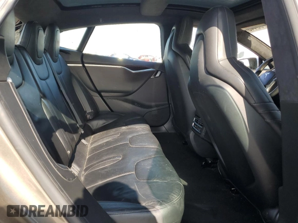 2016 Tesla Model S 90D with VIN 5YJSA1E2XGF133933, listed as a Copart auction lot 60736445 with 203,063 mi miles and Salvage title. Bid and sale history available at DreamBid. Image 10.