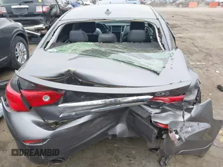 2014 Infiniti Q50 Premium z VIN JN1BV7AP8EM674625, wystawiony jako IAAI lot #41922173 z przebiegiem Nie podano mil oraz . Historia ofert i sprzedaży dostępna na DreamBid. Obrazek 16.