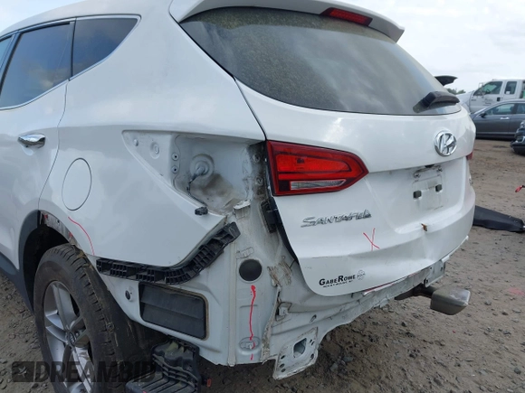 2018 Hyundai Santa Fe 2.4L z VIN 5NMZTDLB9JH060895, wystawiony jako IAAI lot #41939221 z przebiegiem 89 960 mil mil oraz . Historia ofert i sprzedaży dostępna na DreamBid. Obrazek 6.