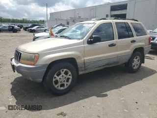 1999 Jeep Grand Cherokee Laredo с VIN 1J4GW58N7XC799434, выставлен на аукционе Copart как лот 64790905 с пробегом 272 384 миль миль и Списание • Salvage title. История ставок и продаж доступна на DreamBid. Изображение 1.