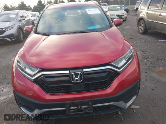 2020 Honda CR-V Touring with VIN 2HKRW2H96LH659793, listed as a IAAI auction lot 41145758 with 113,344 mi miles and . Bid and sale history available at DreamBid. Image 13.