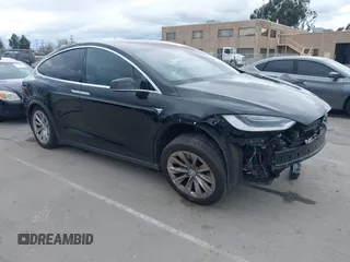 2017 Tesla Model X 90D with VIN 5YJXCAE2XHF075341, listed as a IAAI auction lot 41784008 with 77,439 mi miles and . Bid and sale history available at DreamBid. Image 1.