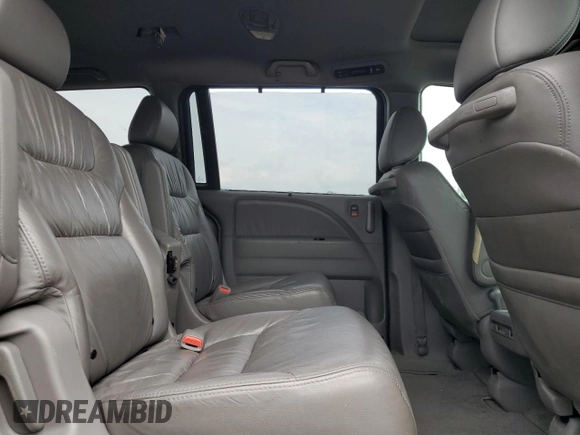 2010 Honda Odyssey EX-L с VIN 5FNRL3H69AB095024, выставлен на аукционе Copart как лот 60102325 с пробегом 235 979 миль миль и Чистый • Clean title. История ставок и продаж доступна на DreamBid. Изображение 11.