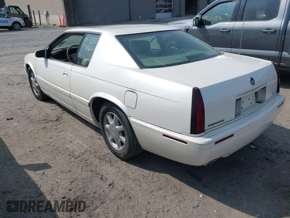 2000 Cadillac Eldorado Touring ETC z VIN 1G6ET129XYU162451, wystawiony jako IAAI lot #42412406 z przebiegiem 89 413 mil mil oraz . Historia ofert i sprzedaży dostępna na DreamBid. Obrazek 3.