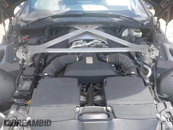 2020 Aston Martin Vantage z VIN SCFSMGAW4LGN03097, wystawiony jako IAAI lot #42227516 z przebiegiem Nie podano mil oraz . Historia ofert i sprzedaży dostępna na DreamBid. Obrazek 10.