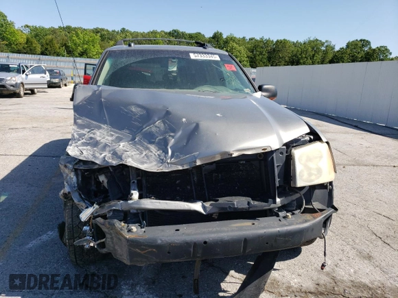 2005 GMC Envoy SLT z VIN 1GKET16M356134877, wystawiony jako Copart lot #57333345 z przebiegiem 205 714 mil mil oraz Szkoda całkowita • Salvage title. Historia ofert i sprzedaży dostępna na DreamBid. Obrazek 5.