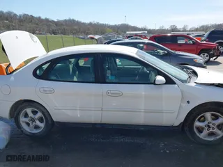 2000 Ford Taurus SE with VIN 1FAFP5327YA186258, listed as a IAAI auction lot 41795342 with 123,174 mi miles. Bid and sale history available at carsss.com. Image 14.