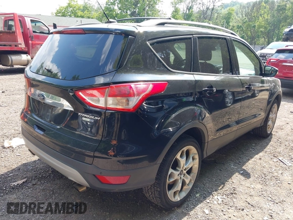 2016 Ford Escape Titanium with VIN 1FMCU9JX1GUC18335, listed as a IAAI auction lot 42396492 with 147,522 mi miles and . Bid and sale history available at DreamBid. Image 4.