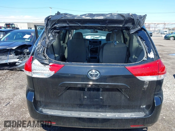 2014 Toyota Sienna LE AAS with VIN 5TDKK3DC4ES445998, listed as a IAAI auction lot 42093872 with 220,943 mi miles. Bid and sale history available at carsss.com. Image 6.