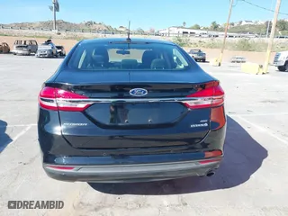 2018 Ford Fusion Hybrid SE with VIN 3FA6P0LU5JR257120, listed as a IAAI auction lot 41859050 with 142,524 mi miles. Bid and sale history available at carsss.com. Image 16.