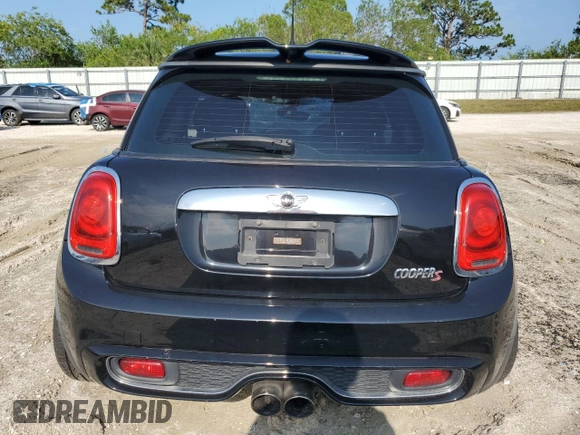 2016 MINI Hardtop S with VIN WMWXP7C58G3B49310, listed as a Copart auction lot 52460835 with 11,209 mi miles and Salvage Title. Bid and sale history available at DreamBid. Image 6.