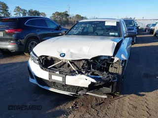 2020 BMW 3 Series M340i xDrive with VIN WBA5U9C00LFH73594, listed as a IAAI auction lot 41574837 with 46,702 mi miles and . Bid and sale history available at DreamBid. Image 6.