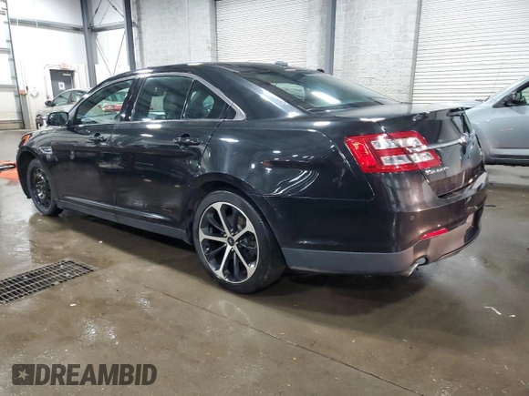 2015 Ford Taurus SEL with VIN 1FAHP2H89FG172117, listed as a Copart auction lot 49491575 with 134,922 mi miles and Salvage Title. Bid and sale history available at carsss.com. Image 2.