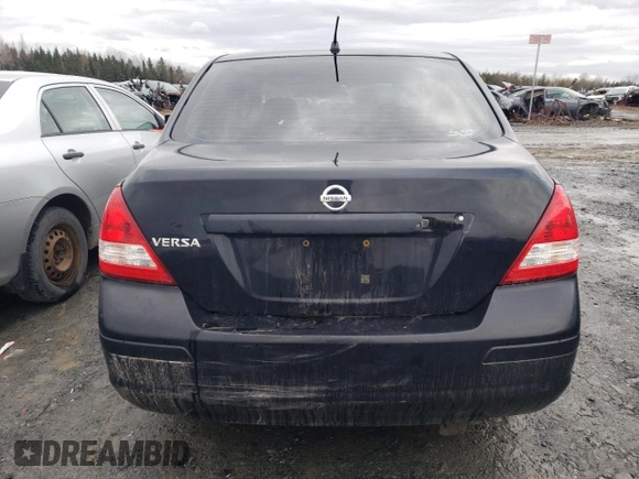 2009 Nissan Versa 1.6 z VIN 3N1CC11E09L468737, wystawiony jako Copart lot #51859825 z przebiegiem Nie podano mil oraz Nie do naprawy. Historia ofert i sprzedaży dostępna na DreamBid. Obrazek 6.