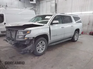 2018 Chevrolet Suburban LT z VIN 1GNSKHKC2JR201282, wystawiony jako IAAI lot #41312994 z przebiegiem 99 783 mil mil oraz . Historia ofert i sprzedaży dostępna na DreamBid. Obrazek 2.