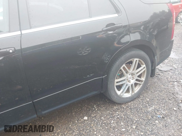 2007 Cadillac SRX with VIN 1GYEE637970188993, listed as a IAAI auction lot 41950192 with 158,786 mi miles and . Bid and sale history available at DreamBid. Image 6.