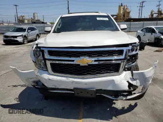 2017 Chevrolet Suburban LS с VIN 1GNSCGKC8HR305762, выставлен на аукционе Copart как лот 57514275 с пробегом 111 928 миль миль и Списание • Salvage title. История ставок и продаж доступна на DreamBid. Изображение 5.