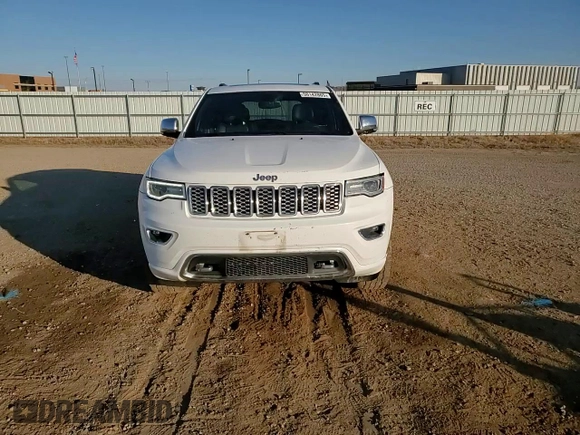 2017 Jeep Grand Cherokee Overland with VIN 1C4RJFCG3HC675125, listed as a Copart auction lot 50142865 with 113,819 mi miles and Salvage Title. Bid and sale history available at carsss.com. Image 12.
