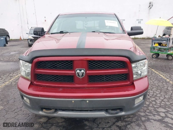 2012 Ram 1500 Outdoorsman with VIN 1C6RD7LT5CS119172, listed as a IAAI auction lot 41286661 with 135,426 mi miles. Bid and sale history available at carsss.com. Image 12.