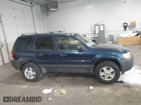 2003 Ford Escape XLT Popular with VIN 1FMYU03103KA06087, listed as a IAAI auction lot 42596326 with 210,441 mi miles and . Bid and sale history available at DreamBid. Image 13.