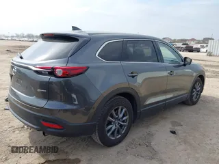 2021 Mazda CX-9 Touring with VIN JM3TCACY7M0516185, listed as a IAAI auction lot 41524084 with 53,084 mi miles. Bid and sale history available at carsss.com. Image 4.