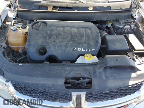 2012 Dodge Journey SXT z VIN 3C4PDDBG0CT293331, wystawiony jako Copart lot #62602995 z przebiegiem 185 605 mil mil oraz Szkoda całkowita • Salvage title. Historia ofert i sprzedaży dostępna na DreamBid. Obrazek 12.