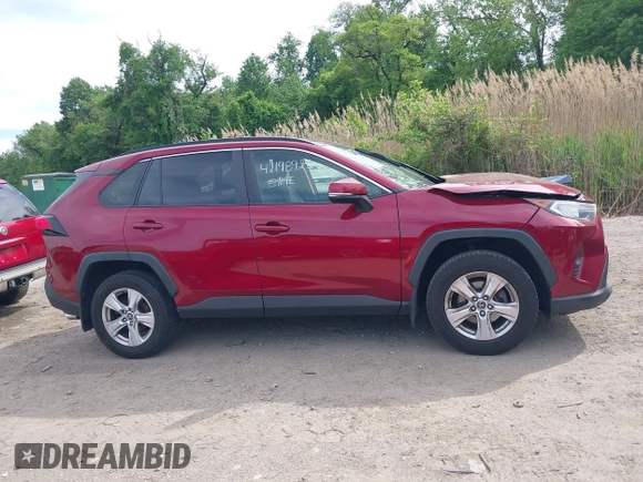 2019 Toyota RAV4 XLE with VIN JTMP1RFV2KD021348, listed as a IAAI auction lot 42198925 with 130,838 mi miles and . Bid and sale history available at DreamBid. Image 13.
