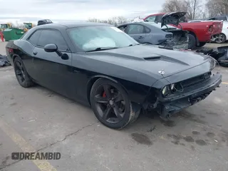 2015 Dodge Challenger R/T with VIN 2C3CDZATXFH712765, listed as a IAAI auction lot 41817210 with 99,535 mi miles and . Bid and sale history available at DreamBid. Image 1.