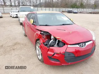 2012 Hyundai Veloster w/Black Int z VIN KMHTC6AD3CU049355, wystawiony jako IAAI lot #41783698 z przebiegiem 121 522 mil mil oraz . Historia ofert i sprzedaży dostępna na DreamBid. Obrazek 6.