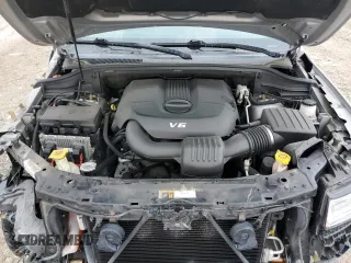 2015 Jeep Grand Cherokee High Altitude with VIN 1C4RJFCG2FC196563, listed as a Copart auction lot 56302315 with 143,759 mi miles and Salvage title. Bid and sale history available at DreamBid. Image 12.