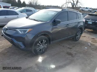 2018 Toyota RAV4 LE with VIN JTMZFREV4JJ183106, listed as a IAAI auction lot 41449468 with 114,719 mi miles. Bid and sale history available at carsss.com. Image 17.