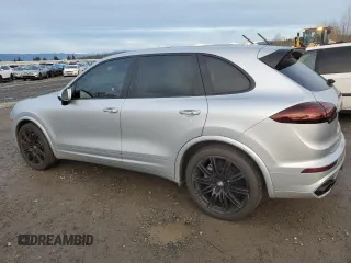 2016 Porsche Cayenne Turbo z VIN WP1AC2A22GLA88192, wystawiony jako Copart lot #86854034 z przebiegiem 42 288 mil mil oraz Szkoda całkowita • Salvage title. Historia ofert i sprzedaży dostępna na DreamBid. Obrazek 2.
