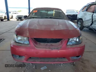 2001 Ford Mustang SVT Cobra z VIN 1FAFP46V41F191300, wystawiony jako Copart lot #66165345 z przebiegiem Nie podano mil oraz Czysty tytuł • Clean title. Historia ofert i sprzedaży dostępna na DreamBid. Obrazek 5.