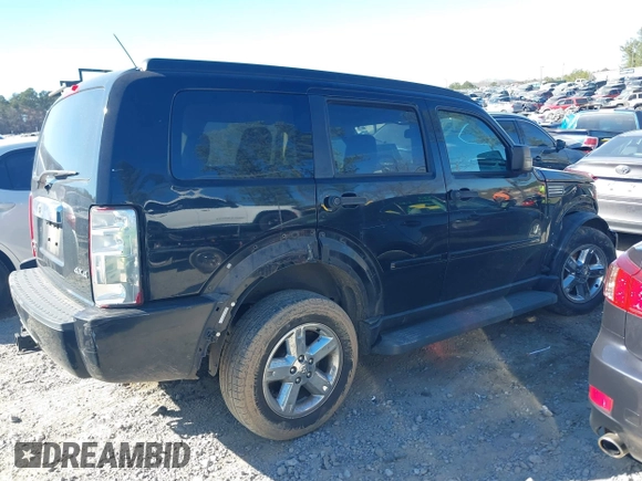 2007 Dodge Nitro SLT z VIN 1D8GU58K87W555759, wystawiony jako IAAI lot #41690213 z przebiegiem 196 779 mil mil oraz . Historia ofert i sprzedaży dostępna na DreamBid. Obrazek 13.