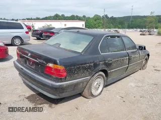 1999 BMW 7 Series 740il with VIN WBAGH8334XDP01166, listed as a IAAI auction lot 42073939 with 1 mi miles. Bid and sale history available at carsss.com. Image 4.