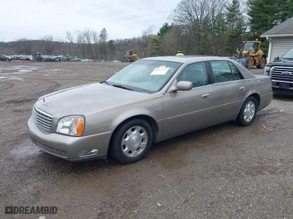 2002 Cadillac DeVille with VIN 1G6KD54Y32U108623, listed as a IAAI auction lot 41957171 with 136,941 mi miles. Bid and sale history available at carsss.com. Image 18.