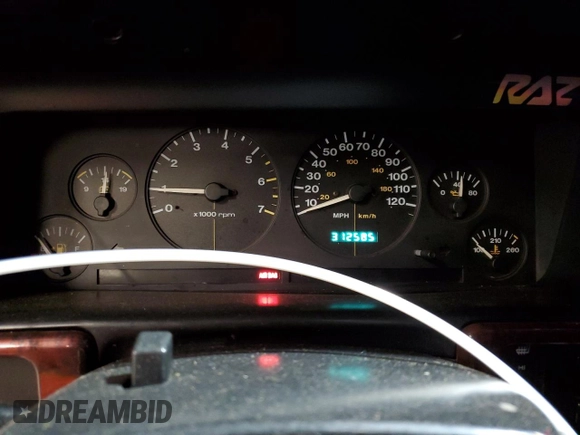 1997 Jeep Grand Cherokee Laredo with VIN 1J4GZ58Y7VC678708, listed as a Copart auction lot 87803725 with 312,585 mi miles and Salvage Title. Bid and sale history available at carsss.com. Image 9.